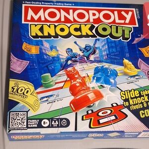Hasbro Monopoly Knock Out Board Game - Red, Blue, Yellow, Green